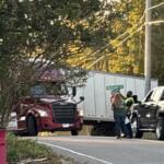 A semi is trapped by power lines at Hickory Grove Boulevard and McGregor Drive on Oct. 13, 2026. (Kendall Welsh, contributed)