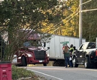 A semi is trapped by power lines at Hickory Grove Boulevard and McGregor Drive on Oct. 13, 2026. (Kendall Welsh, contributed)