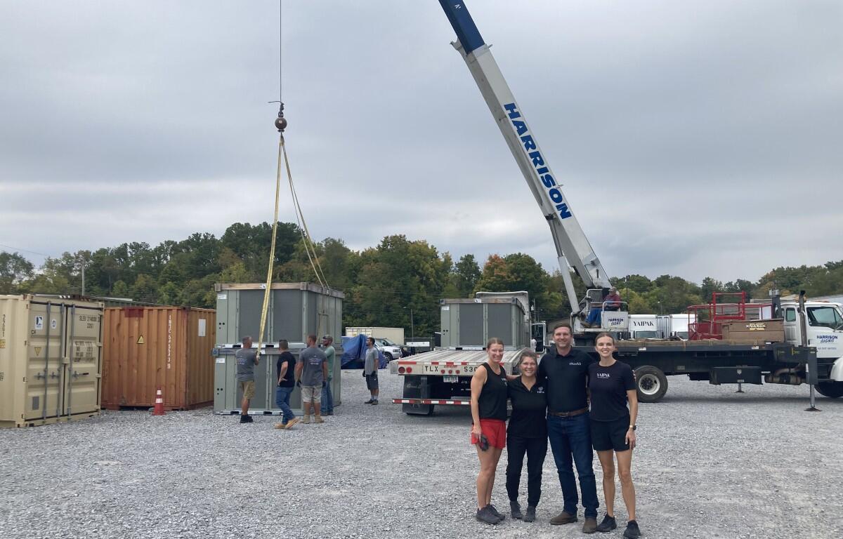 Trane's donation of five industrial AC units to the YAIPAK warehouse on Oct. 2, 2026. (Christian Brown)