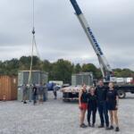 Trane's donation of five industrial AC units to the YAIPAK warehouse on Oct. 2, 2026. (Christian Brown)
