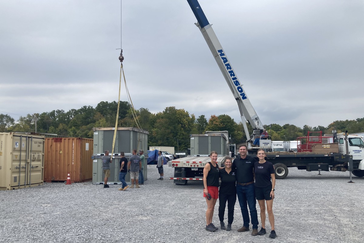 Trane's donation of five industrial AC units to the YAIPAK warehouse on Oct. 2, 2026. (Christian Brown)
