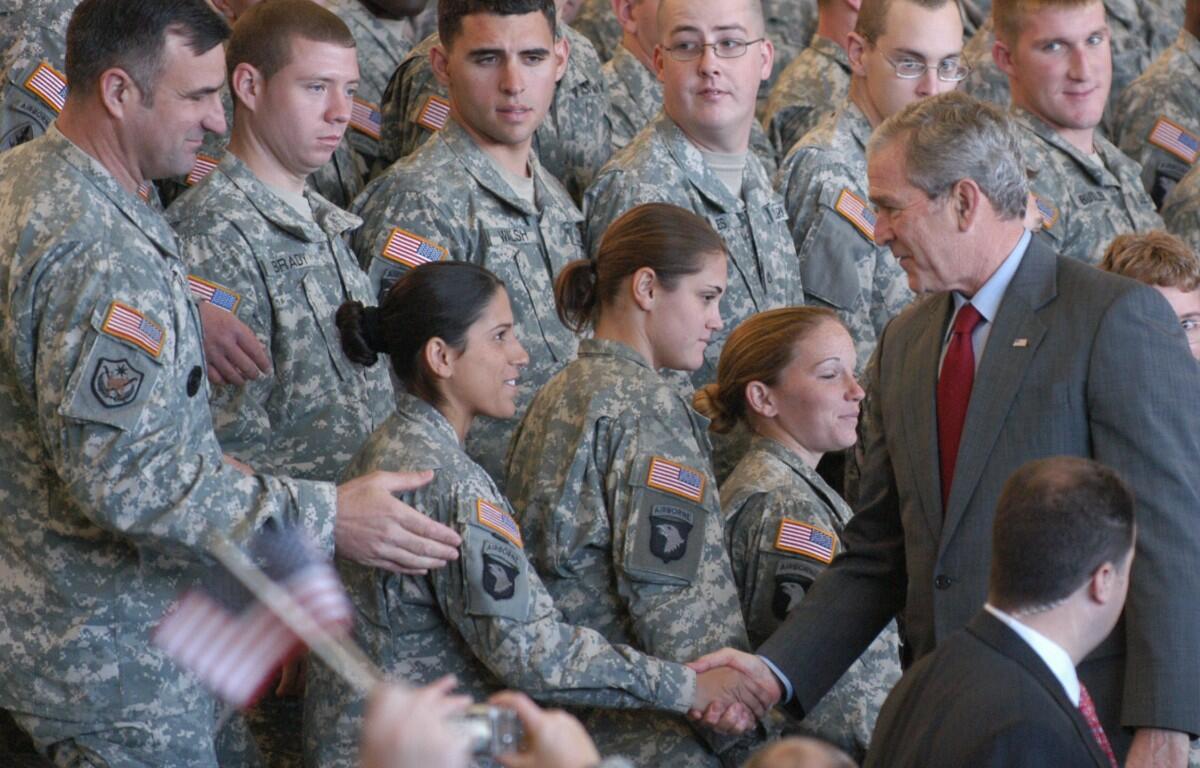 President Bush shakes hands with soldiers at Fort Campbell, Ky. during a visit on Nov. 25, 2008. (U.S. Army photo)