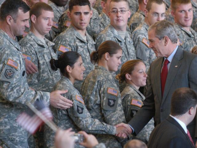President Bush shakes hands with soldiers at Fort Campbell, Ky. during a visit on Nov. 25, 2008. (U.S. Army photo)